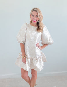 The Lola Jacquard Ruffle Shift Dress in Champagne